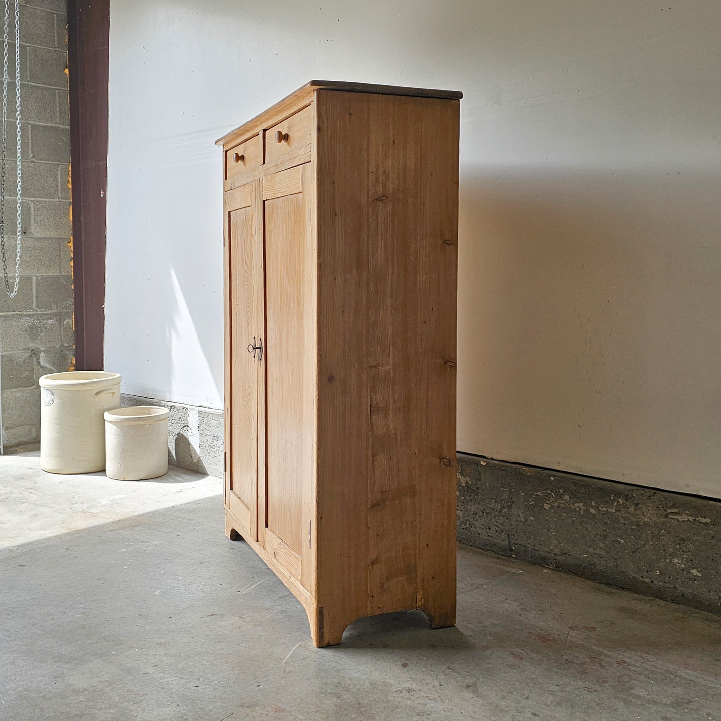 Antique pine cupboard with drawers