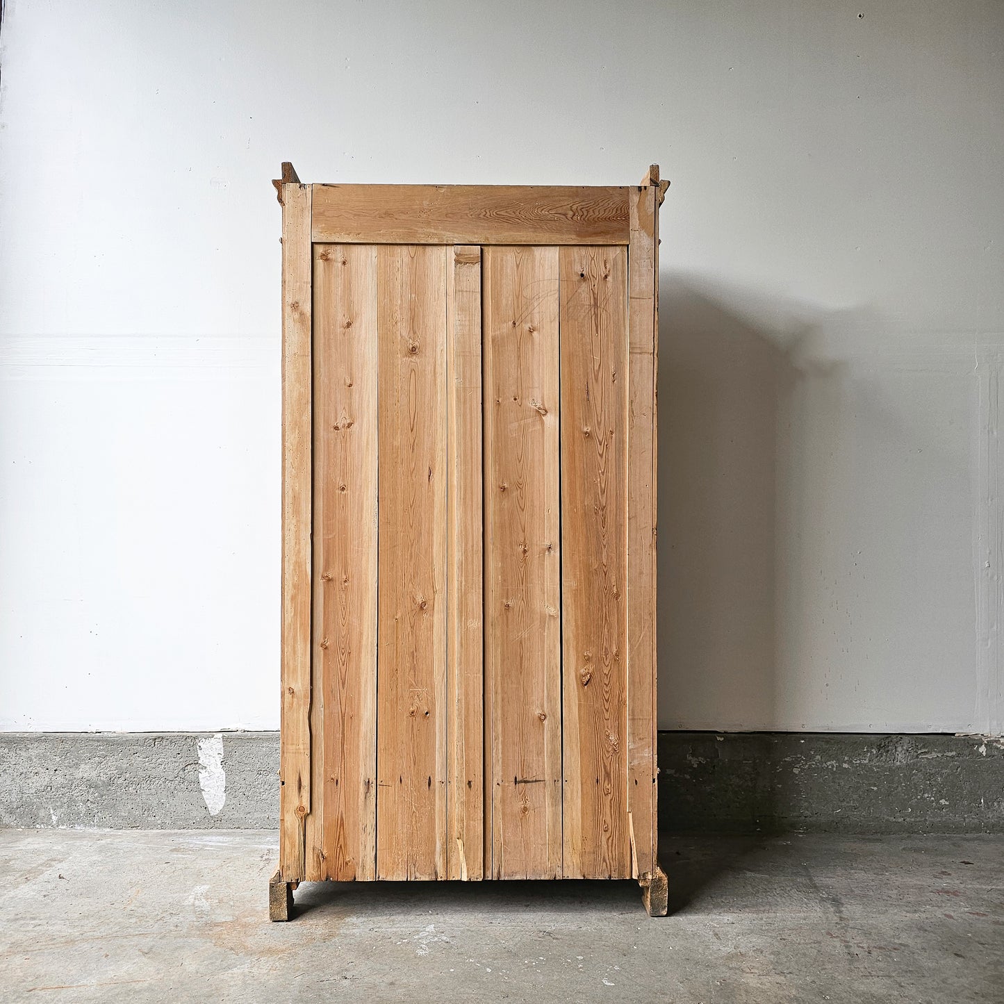 Antique pine single-door armoire cabinet