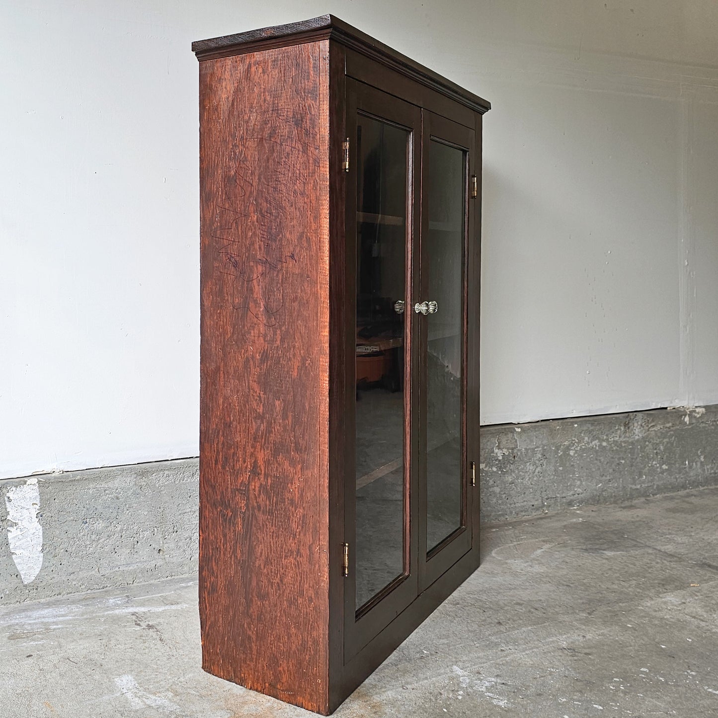 Early 1900's American cabinet with glass doors