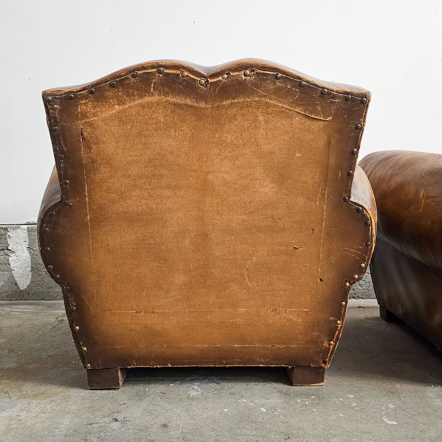 Pair of 1920's French Leather Mustache Club Chairs