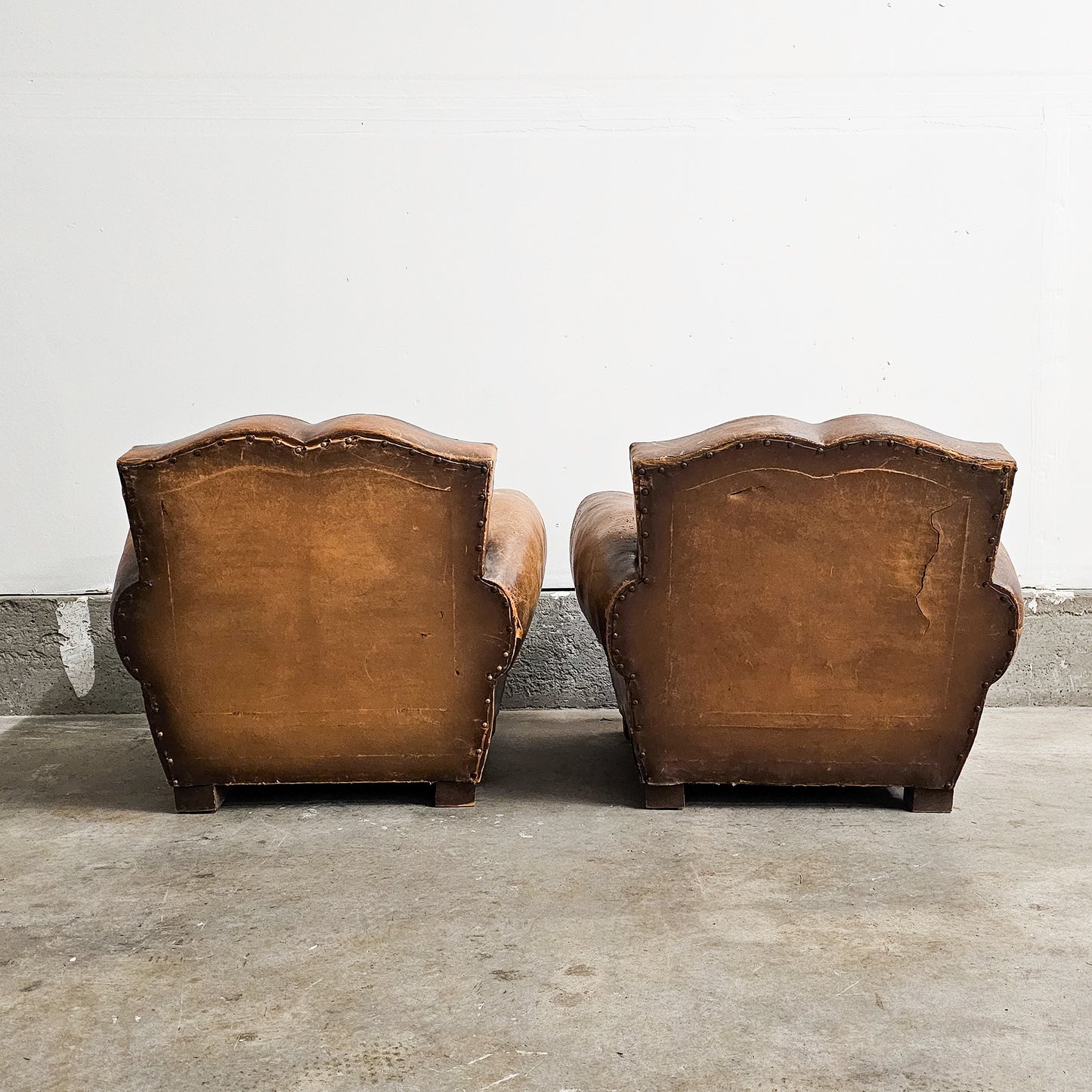 Pair of 1920's French Leather Mustache Club Chairs