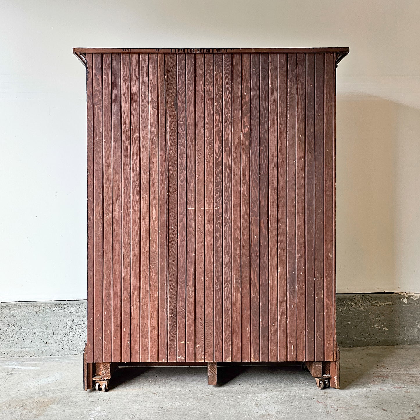 Antique wood cabinet with glass doors
