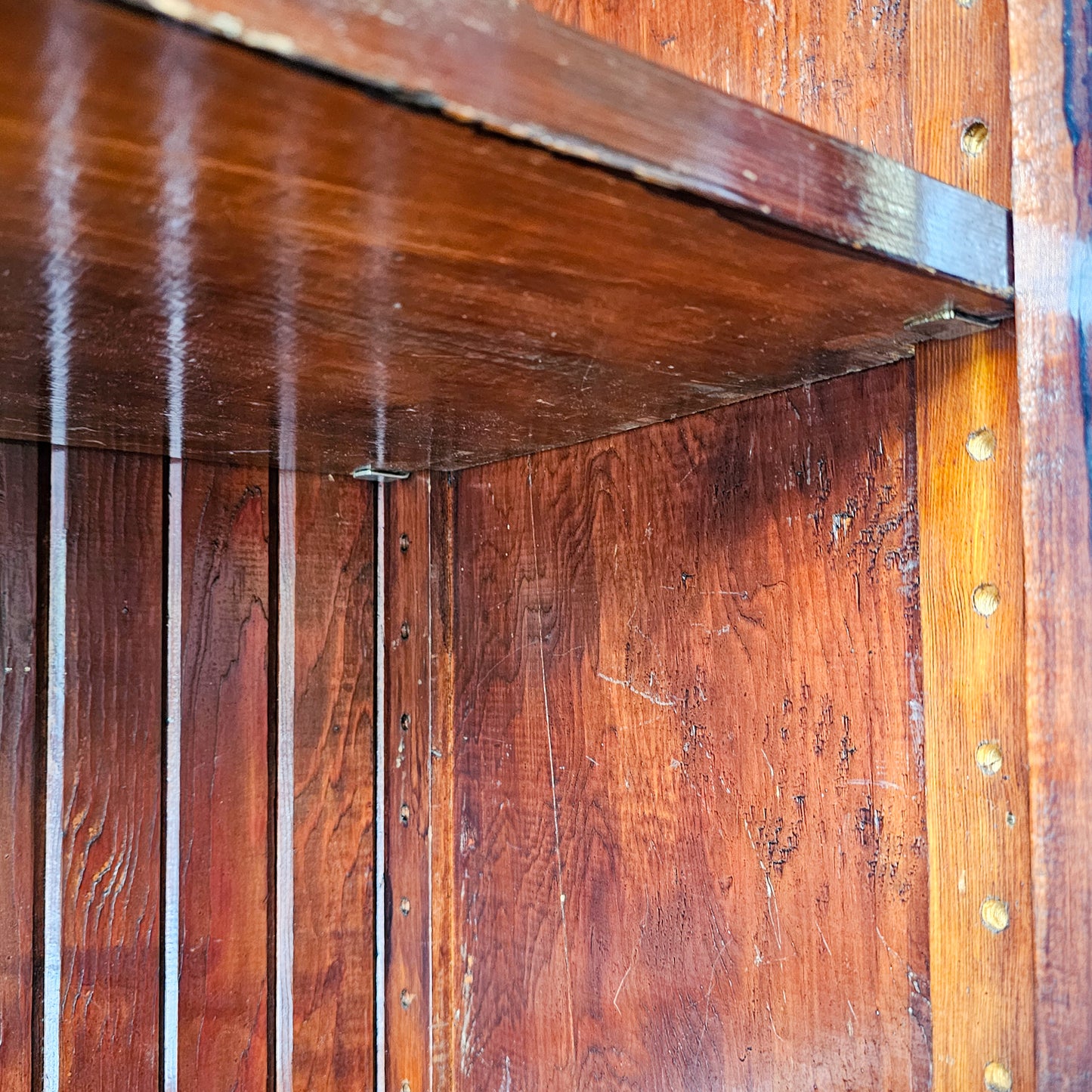 Antique wood cabinet with glass doors