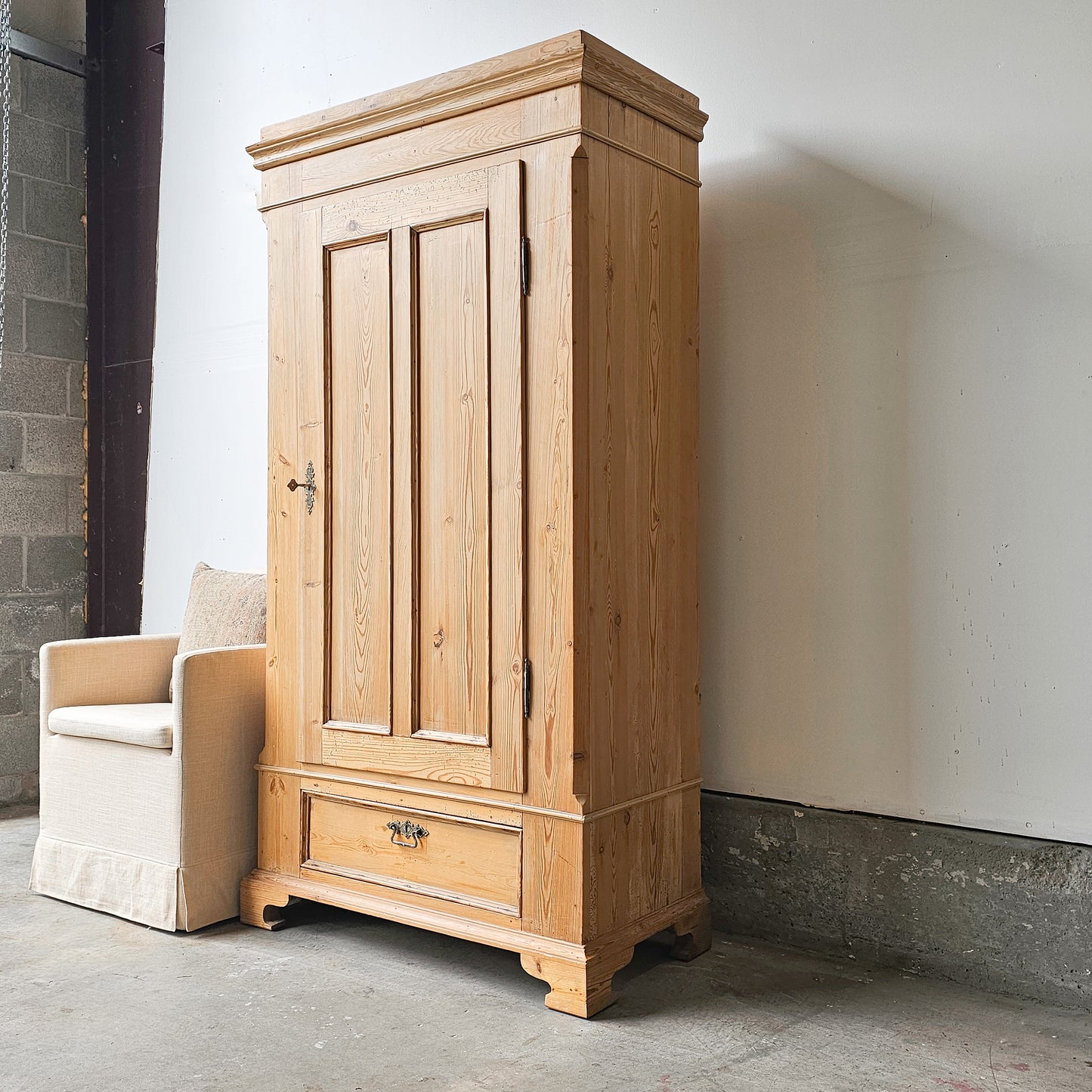 Antique pine single-door armoire cabinet
