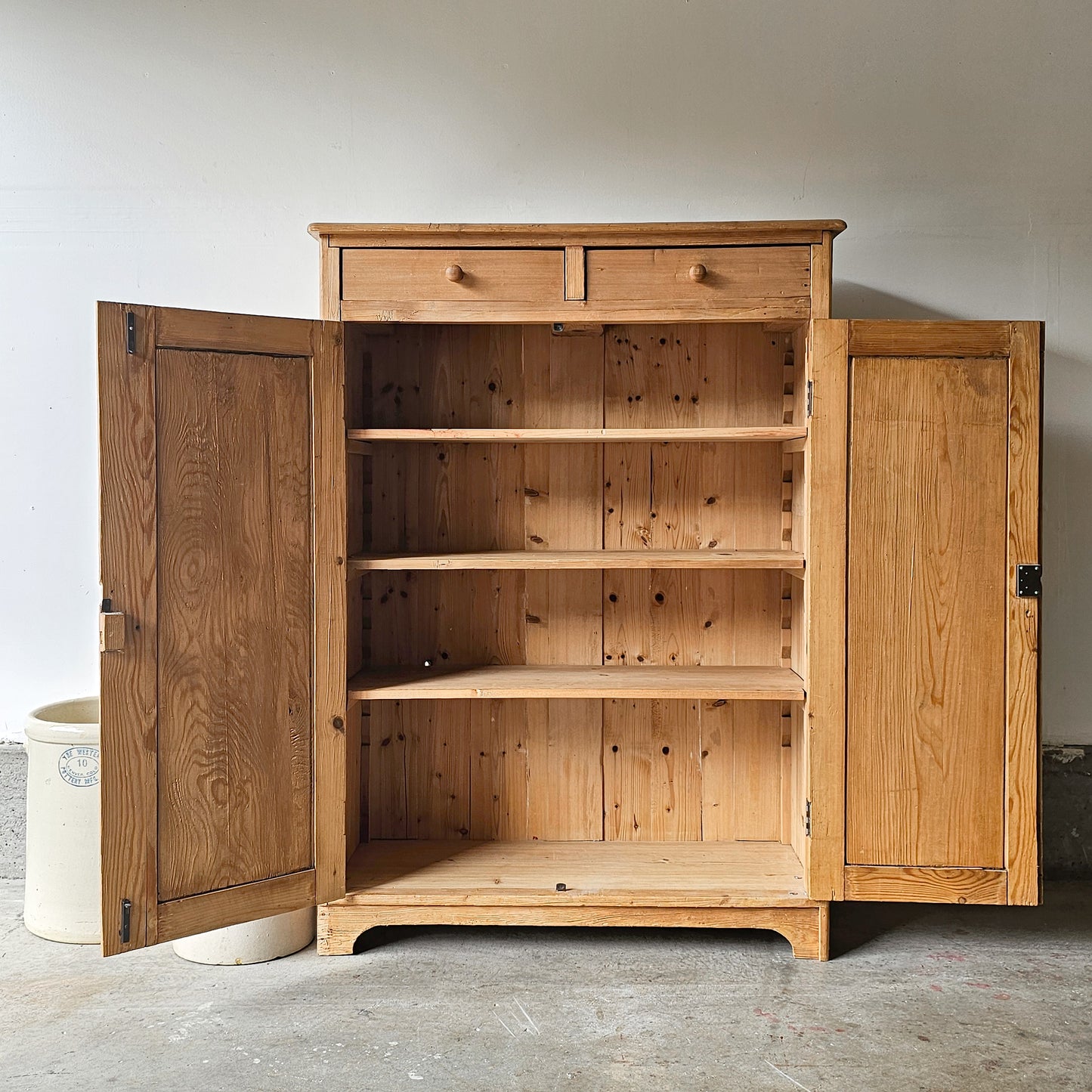 Antique pine cupboard with drawers