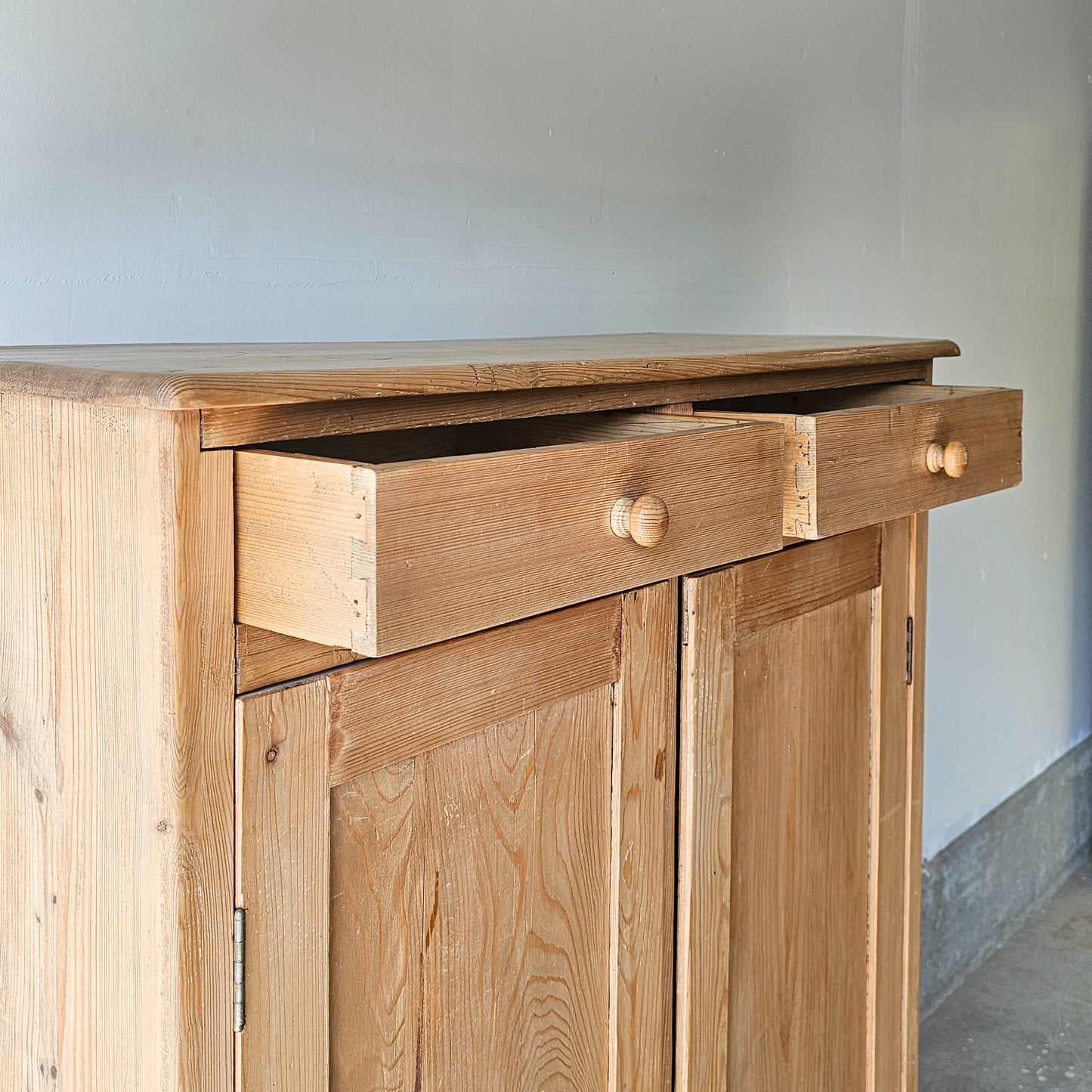 Antique pine cupboard with drawers