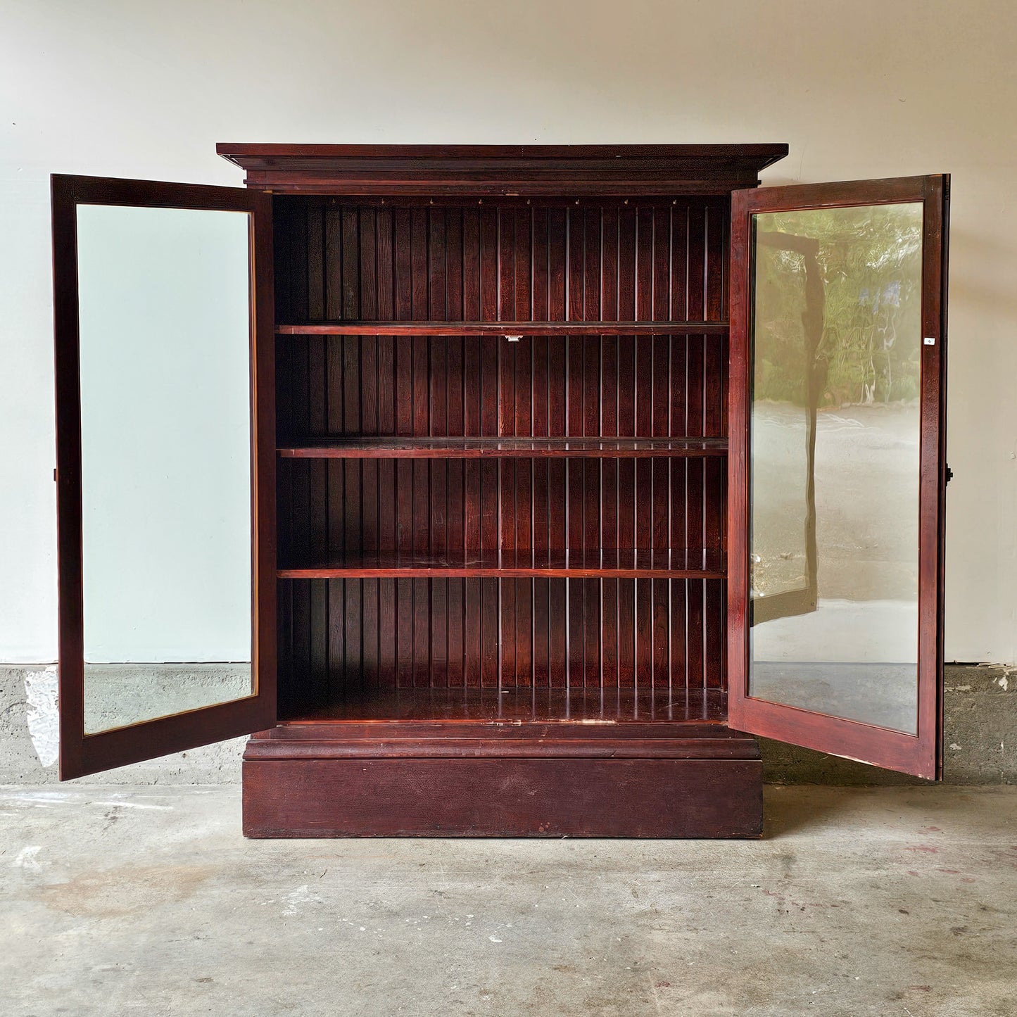 Antique wood cabinet with glass doors