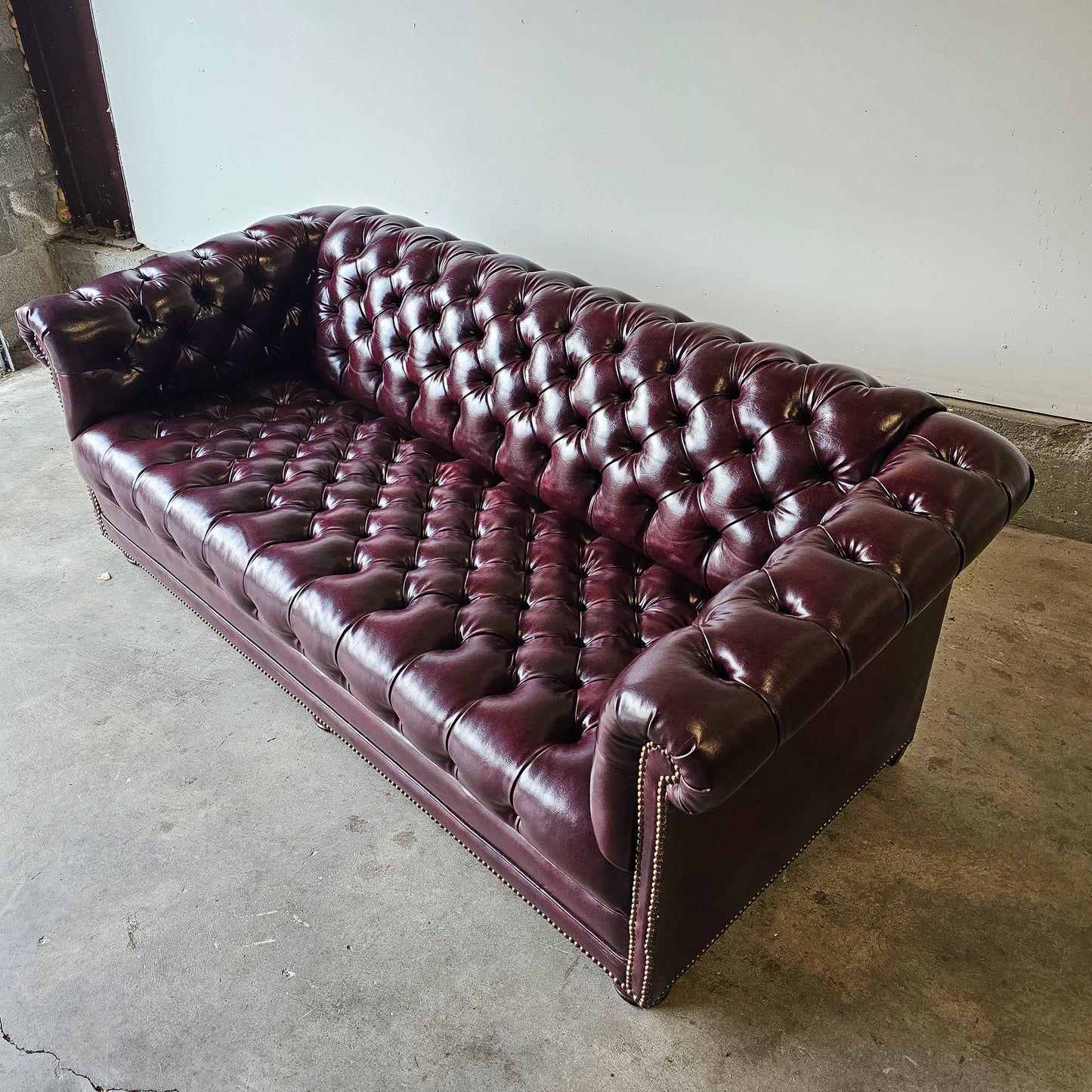 Vintage 1970's tufted chesterfield leather sofa