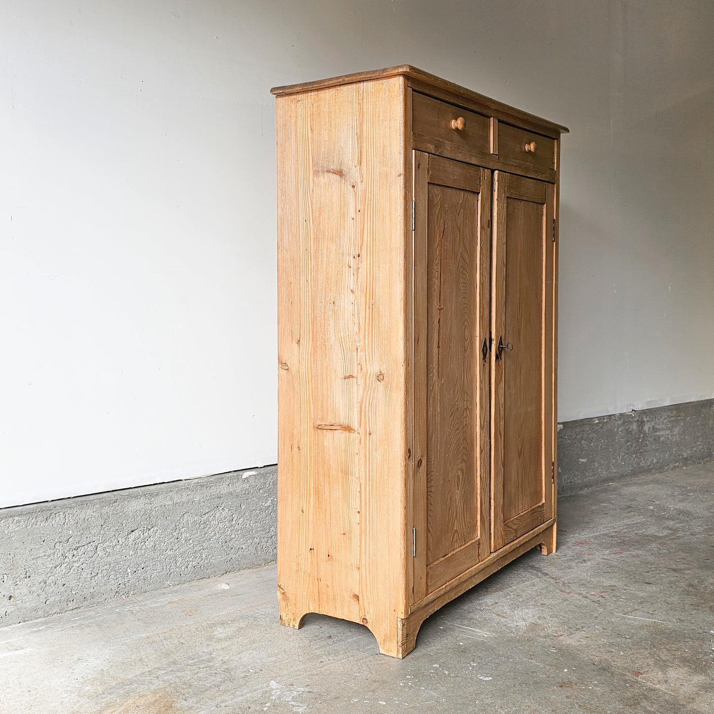 Antique pine cupboard with drawers
