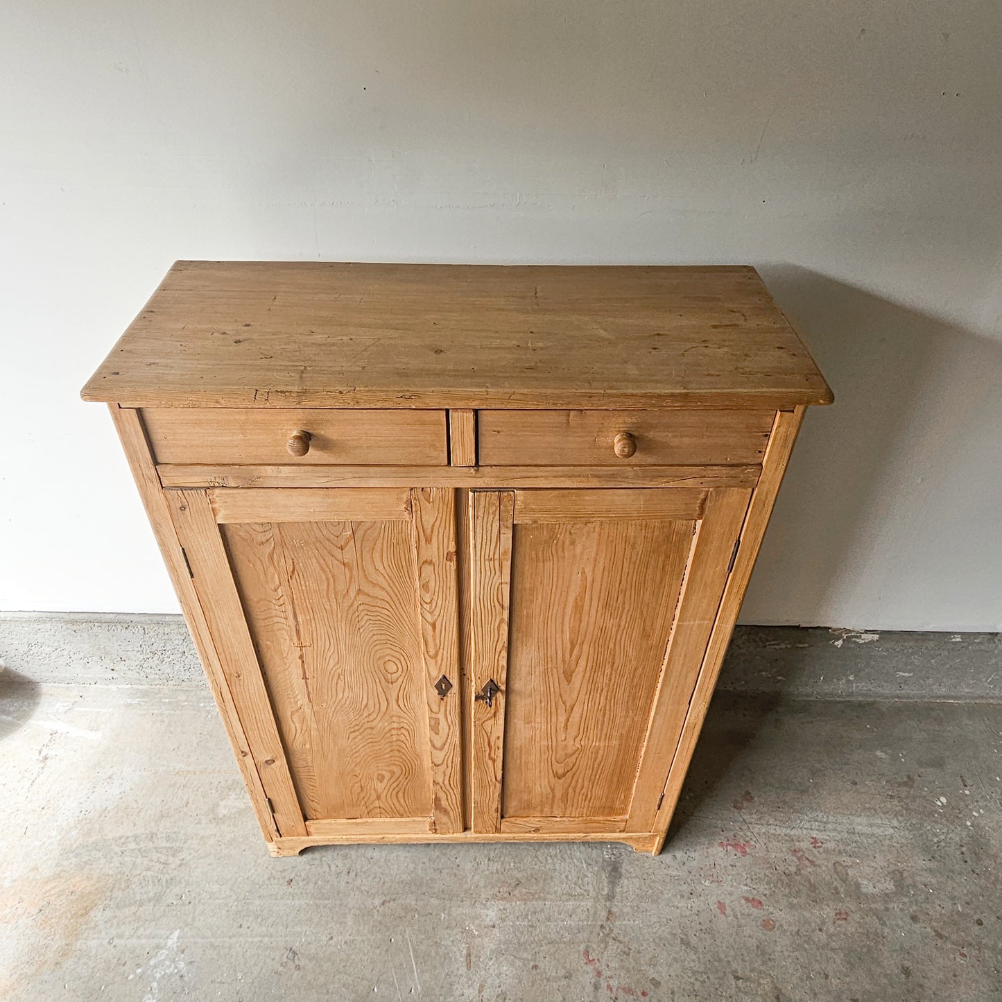Antique pine cupboard with drawers