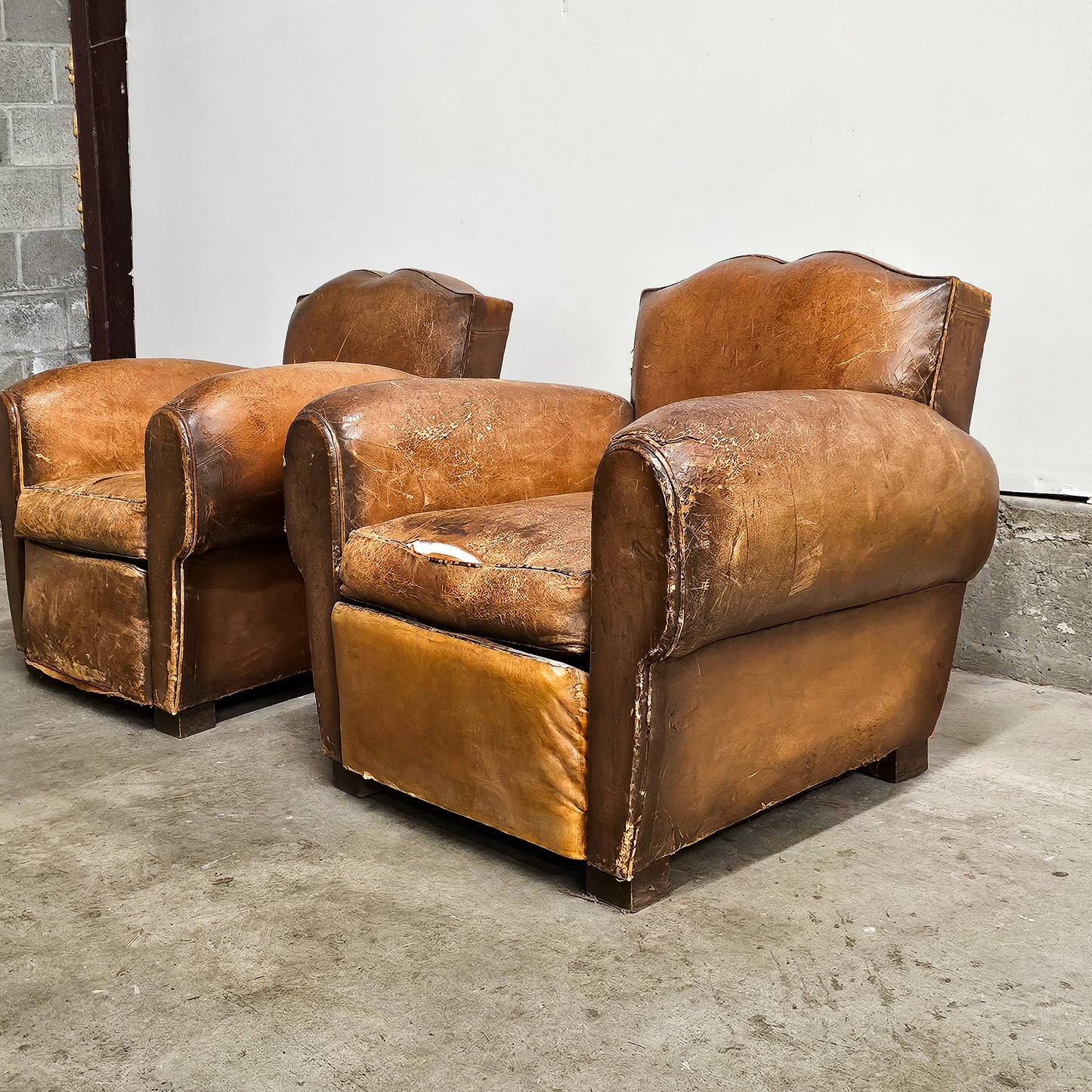 Pair of 1920's French Leather Mustache Club Chairs