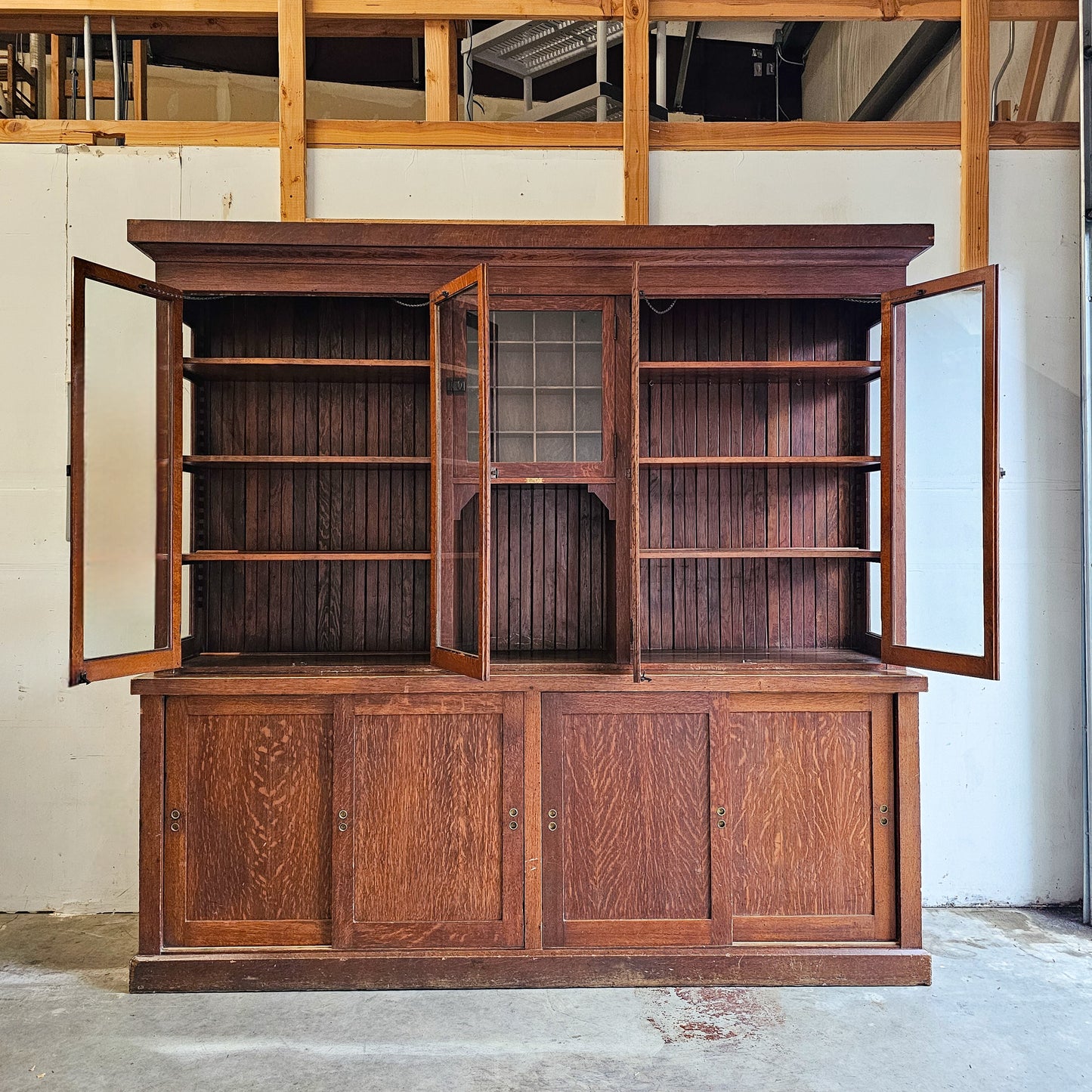 Stately Antique general store display cabinet