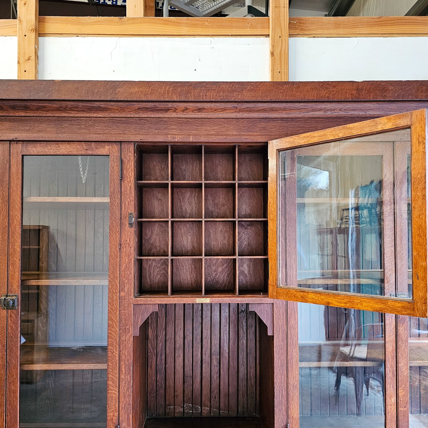 Stately Antique general store display cabinet