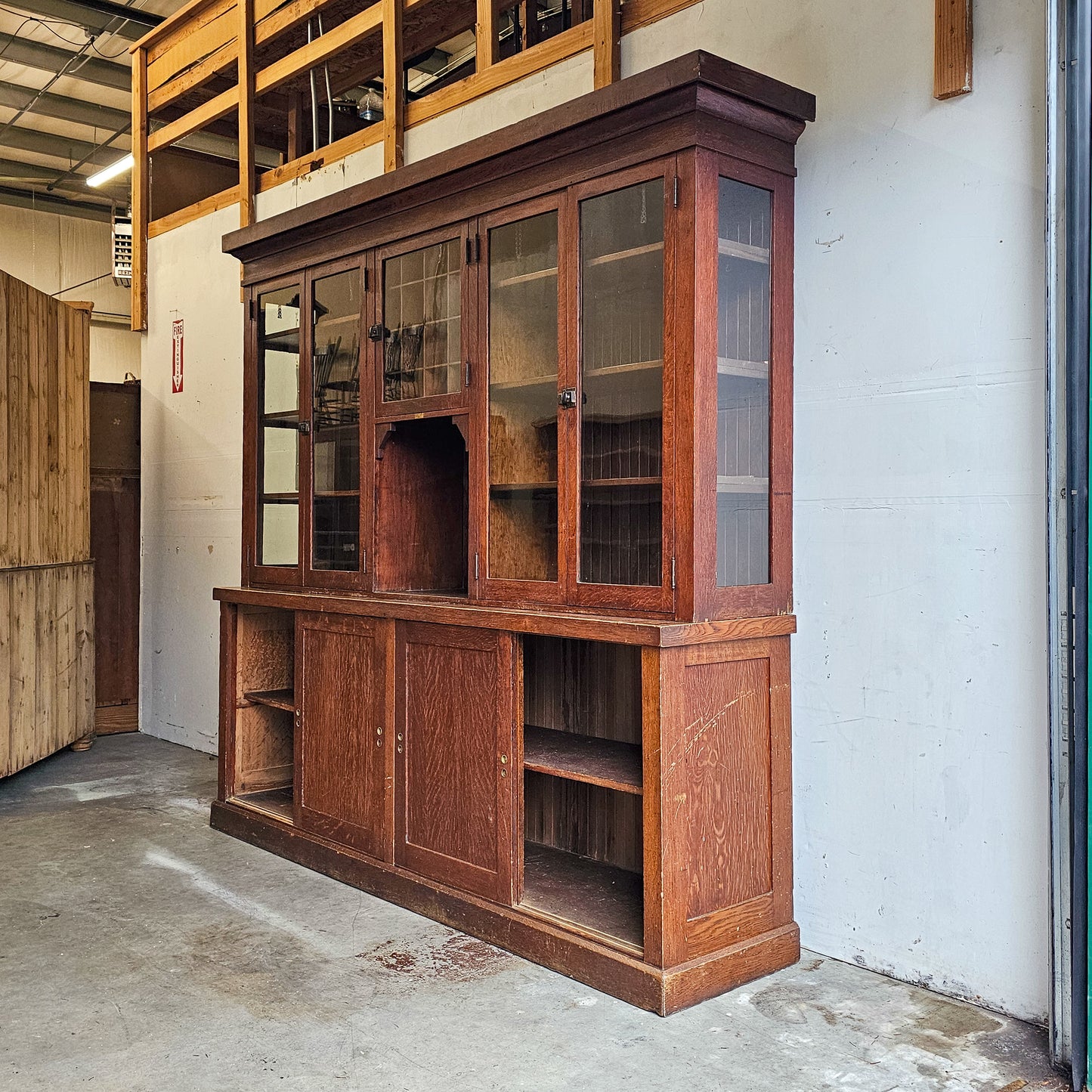 Stately Antique general store display cabinet
