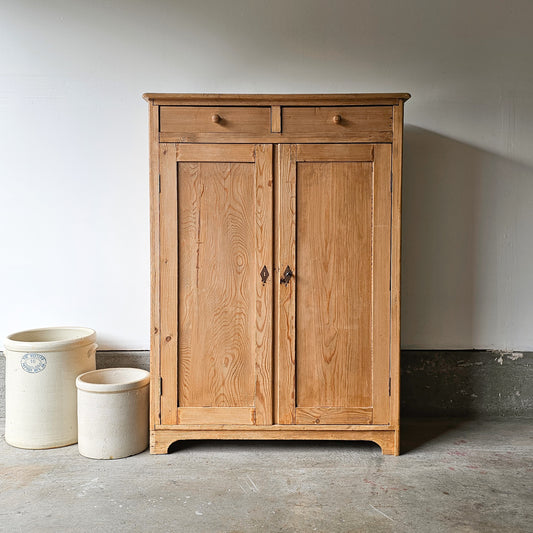 Antique pine cupboard with drawers
