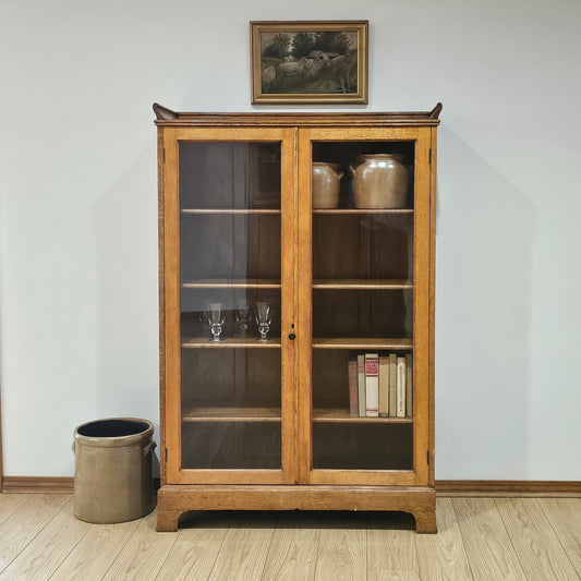 Oak cabinet by H.C. Breeden Co.